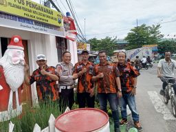 PAC Pemuda Pancasila Sawahan Bersinergi dengan Polsek Amankan Malam Tahun Baru