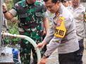 Sedikitnya 700 KK Mendapat Bantuan Air Bersih dari Polres Jember dan Kodim 0824