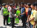 Polres Nganjuk Salurkan Bantuan Kemanusiaan ke 50 Kurir Paket